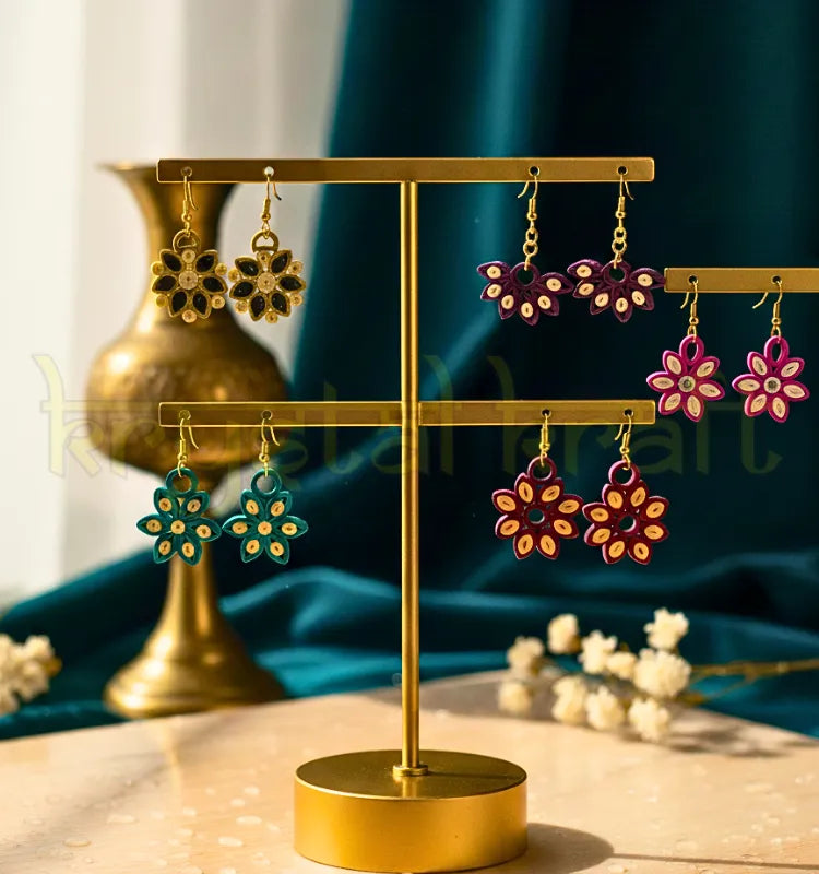 Handmade eco-friendly paper quilling earrings set of 5 by Krystal Kraft, crafted by artist Farisa Merchant.
