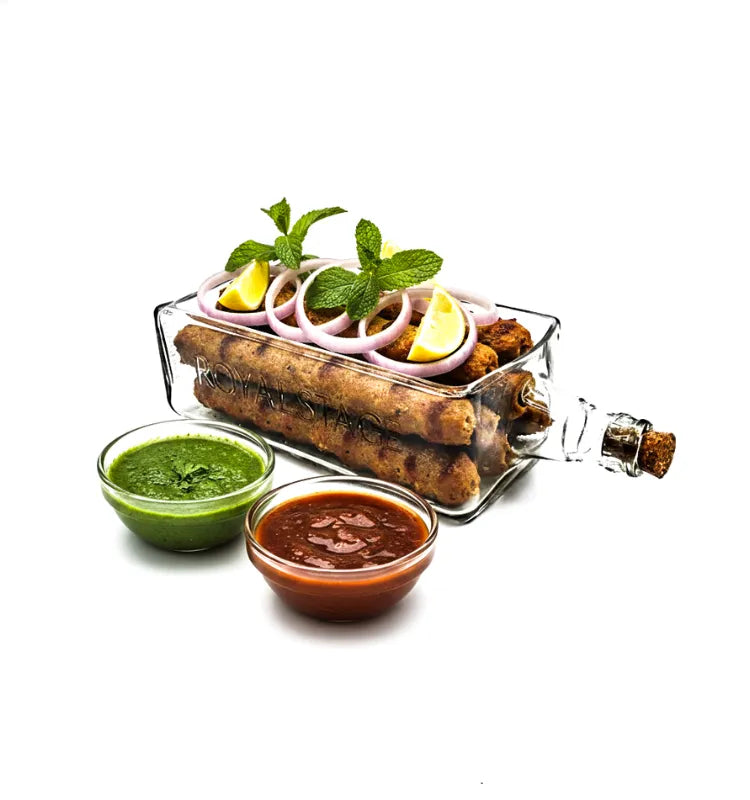 A handcrafted serving platter made from an authentic upcycled Royal Stag 2L bottle, featuring its iconic red and gold hues with a polished finish—perfect for serving snacks, cheese, or appetizers sustainably.