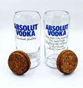 Elegant set of two upcycled Absolut bottle jars retaining signature design, perfect as an eco-conscious gift or decorative accent for modern homes.