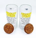 Pair of upcycled Absolut Citron jars made from authentic bottles, showcasing polished glass finish and bold branding for stylish, sustainable interiors.