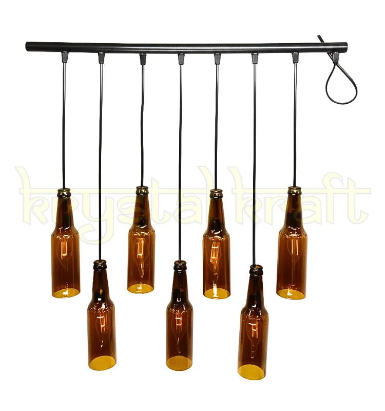 Eco-friendly upcycled beer bottle pendant lamp handmade by Krystal Kraft for sustainable home décor.