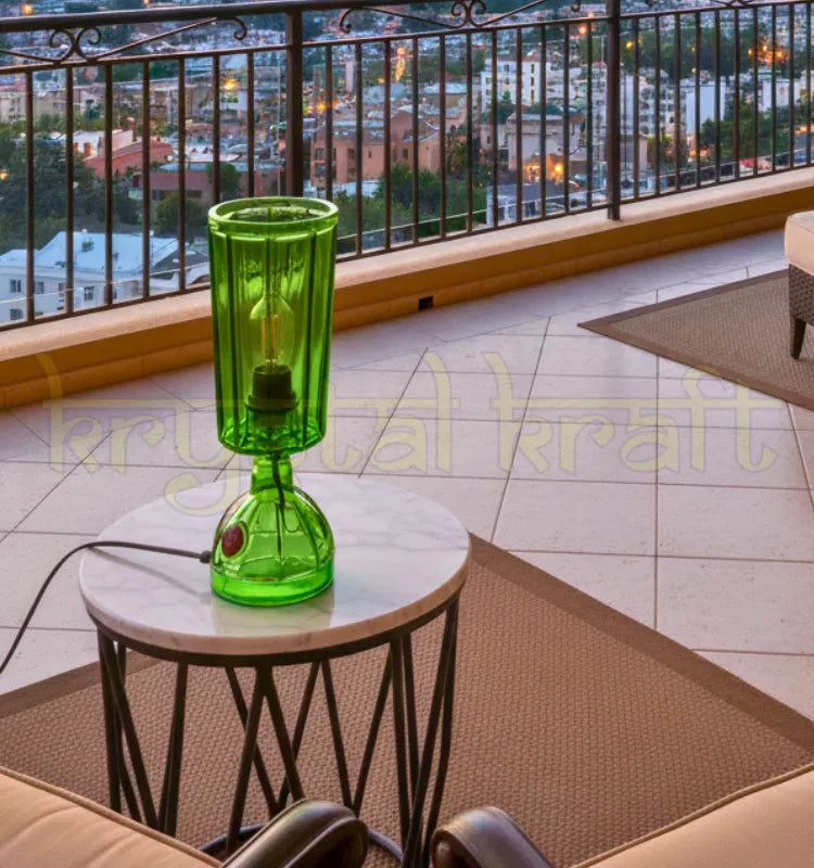 Upcycled glass bottle lamp designed as eco friendly decorative lighting.