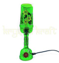 Eco friendly upcycled glass bottle lamp used for sustainable lighting decor.