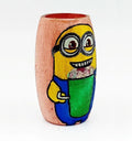 Playful Minion holding ice cream, hand-painted on a pink recycled glass mini bottle with eco-friendly materials and sealed for long-lasting shine.