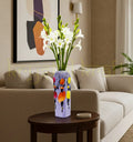 Hand-painted Dancing African Lady bottle art crafted from recycled glass with acrylic paints and a Liquitex finish — a vibrant eco-friendly décor piece for homes or offices.