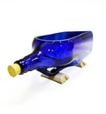 Smooth hand-polished rim of upcycled blue bottle planter