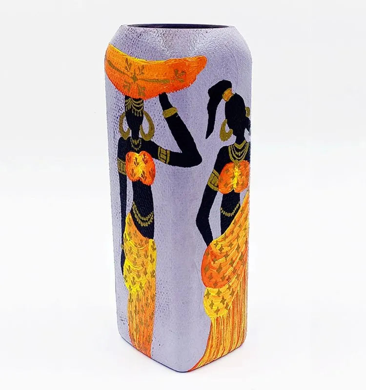 Handcrafted recycled bottle featuring detailed African lady artwork in vibrant acrylics — an eco-conscious vase perfect for table decoration or gifting.