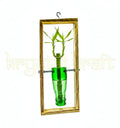 A sustainable wall planter made from a repurposed green neck bottle fixed on a decorative frame, ideal for succulents, herbs, and air plants in eco-conscious spaces.