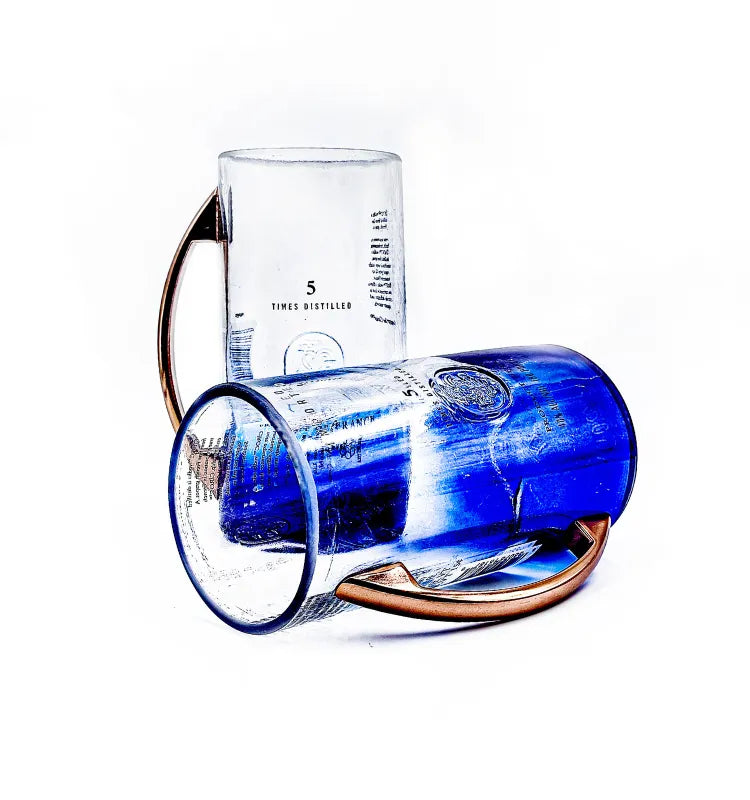 Beautiful handcrafted recycled glass tumblers created from Ciroc bottles, featuring polished finishes and artistic upcycled design.