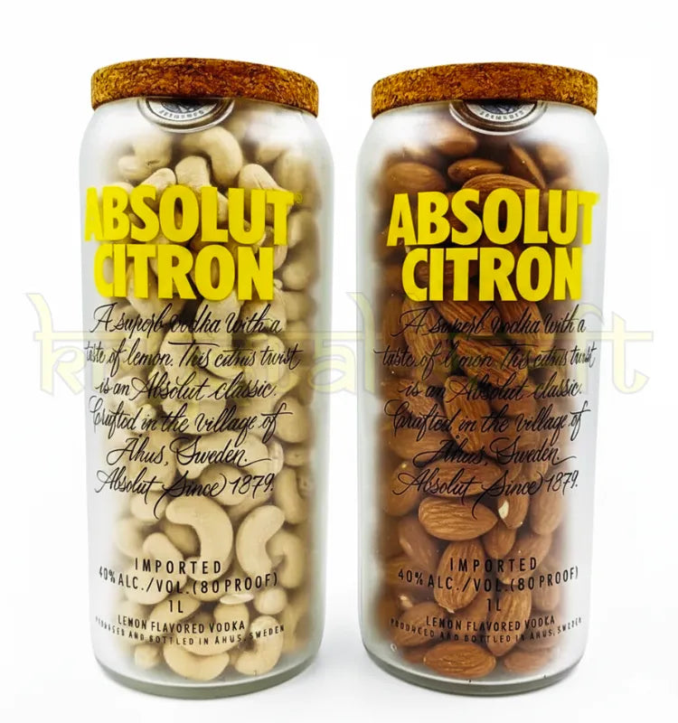 Beautifully handcrafted Absolut Citron bottle jars retaining original yellow branding and sleek design—ideal for sustainable home decor or snack storage.