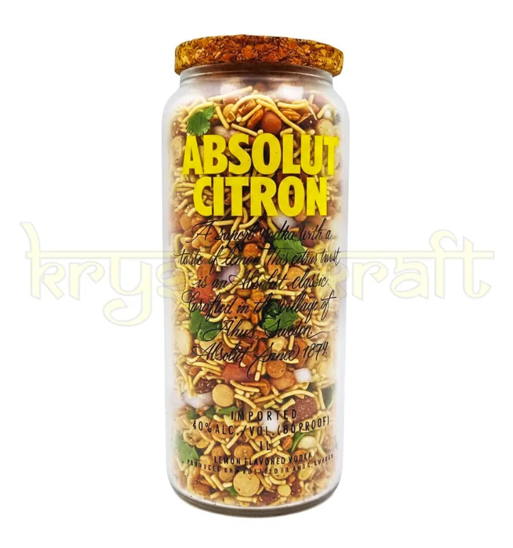 Beautifully repurposed Absolut Citron bottle transformed into a sleek, polished jar retaining its original branding—ideal as a vase or stylish storage piece.