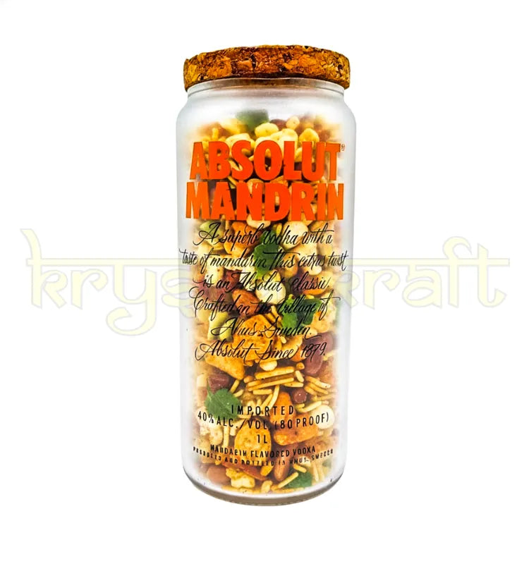 Handcrafted upcycled Absolut Mandrin jar made from original bottle, featuring orange branding and polished finish—perfect for eco-friendly home decor or storage.