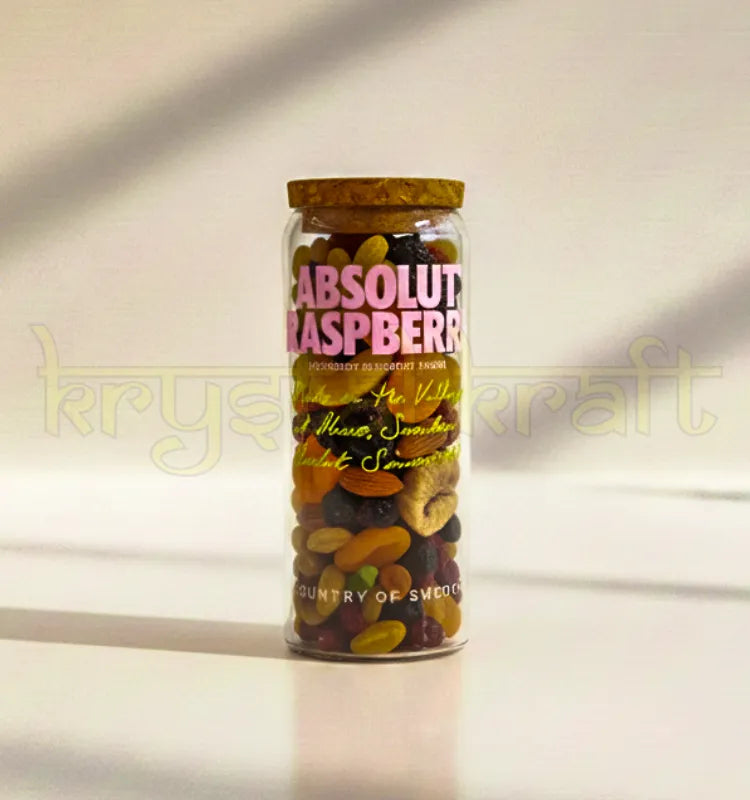 Beautifully repurposed Absolut Raspberri bottle turned into a sleek, polished glass jar, ideal for storage, flower display, or sustainable decoration.