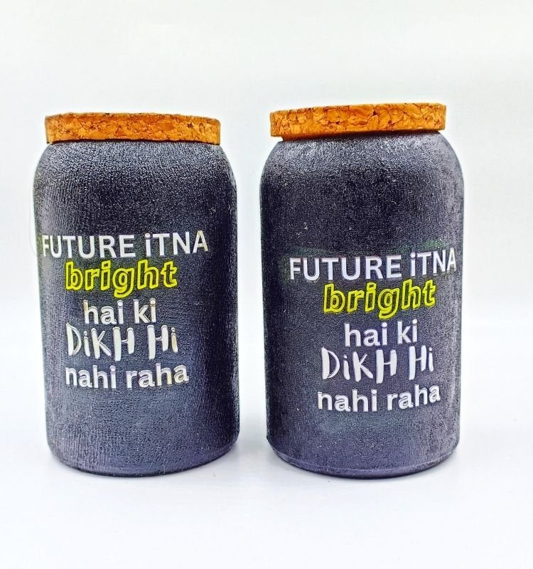 Beautifully handcrafted upcycled Jaisalmer bottle jars with cork lids and engraved quotes, perfect for sustainable kitchen storage or modern eco-decor accents.