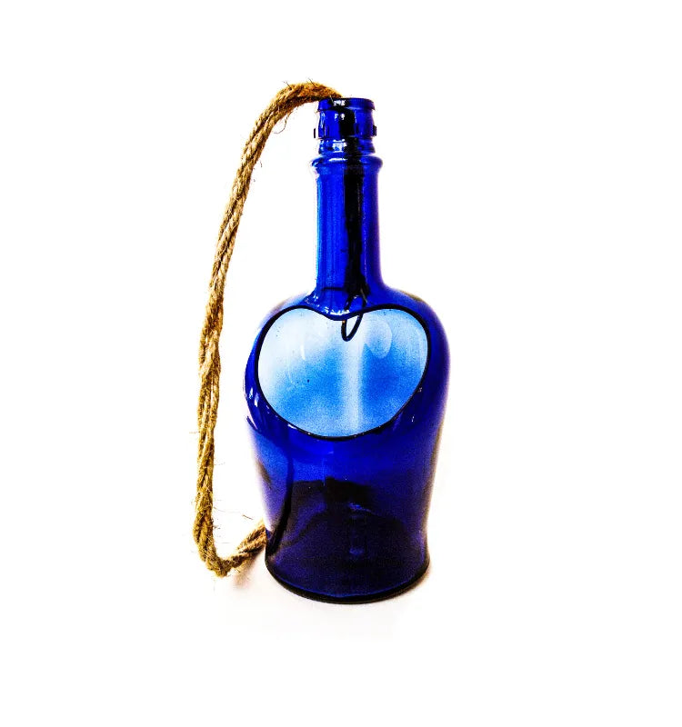Unique handcrafted hanging planter made from recycled Antiquity Blue bottle with smooth edges and rustic jute rope.