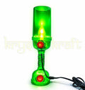 Artisan bottle lamp created using repurposed glass bottle lighting.