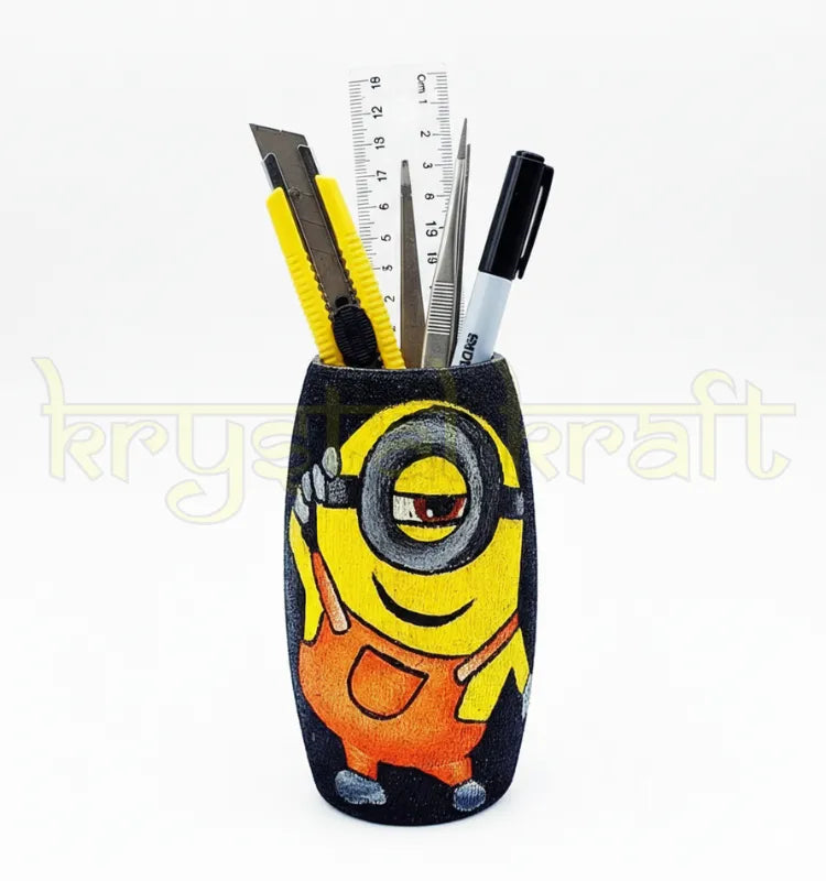 Unique handmade bottle art featuring a Cool Minion design on a black base, painted in bright orange and yellow acrylics — crafted by artist Farisa Merchant.