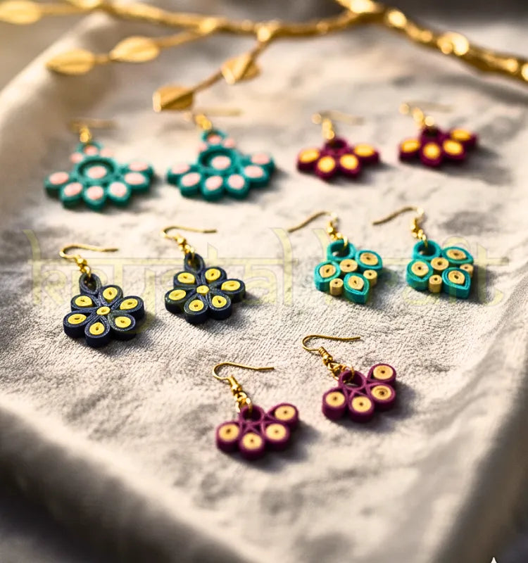 Eco-friendly handmade paper quilling earrings set of 5 by Krystal Kraft, crafted by artist Farisa Merchant"