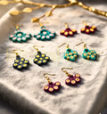 Eco-friendly handmade paper quilling earrings set of 5 by Krystal Kraft, crafted by artist Farisa Merchant