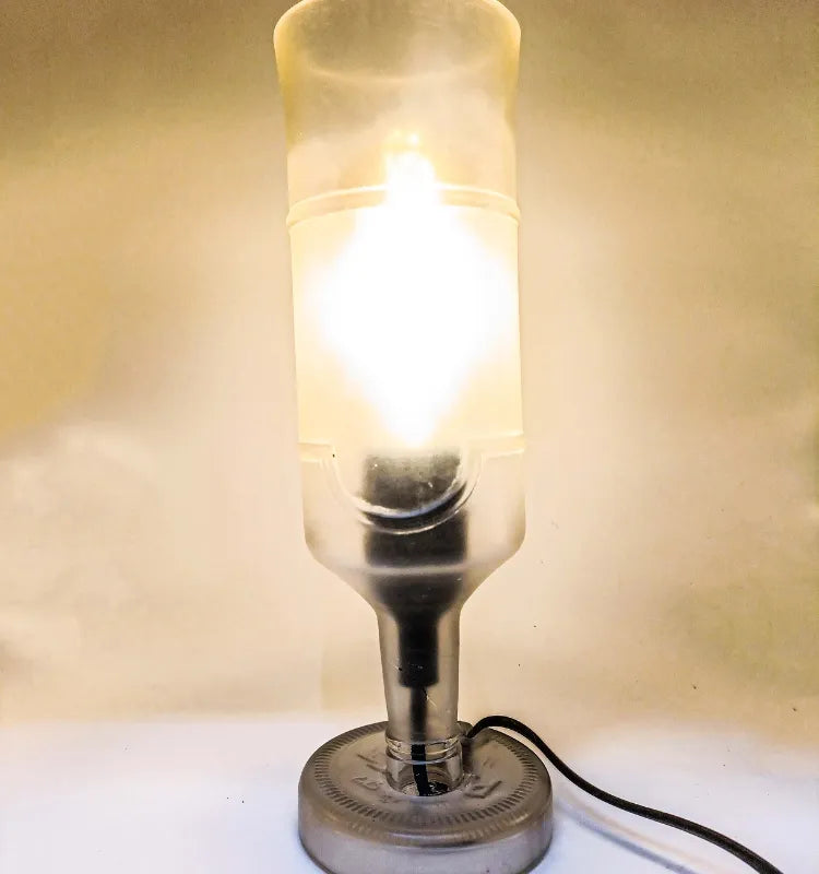 Upcycled glass bottle night lamp for eco-conscious interiors