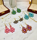Handmade paper quilling earrings set of 5 by Krystal Kraft featuring colorful jhumka and stud designs crafted by artist Farisa Merchant.
