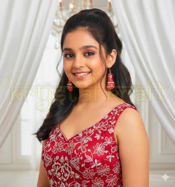 Model wearing Artisan Kolhapuri paper quilling earrings styled with traditional Indian outfit, showcasing lightweight sustainable earrings perfect for festivals and weddings.