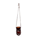 Chemical brown handmade glass hanging planter with drilled outlet for drainage, ideal for sustainable gardening.