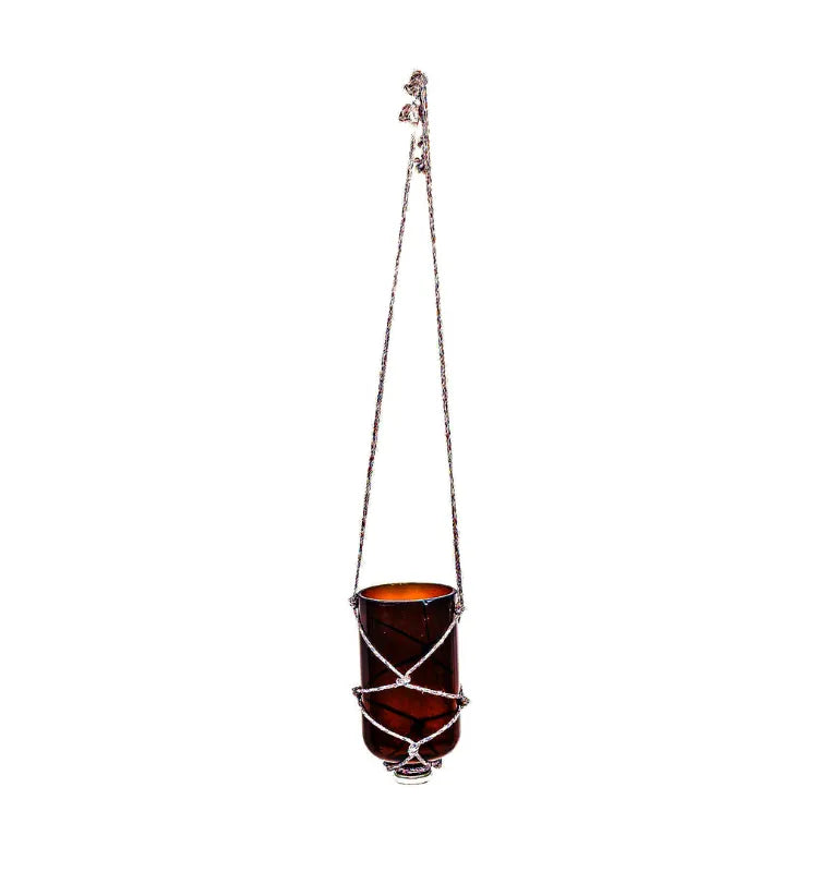 Chemical brown handmade glass hanging planter with drilled outlet for drainage, ideal for sustainable gardening.