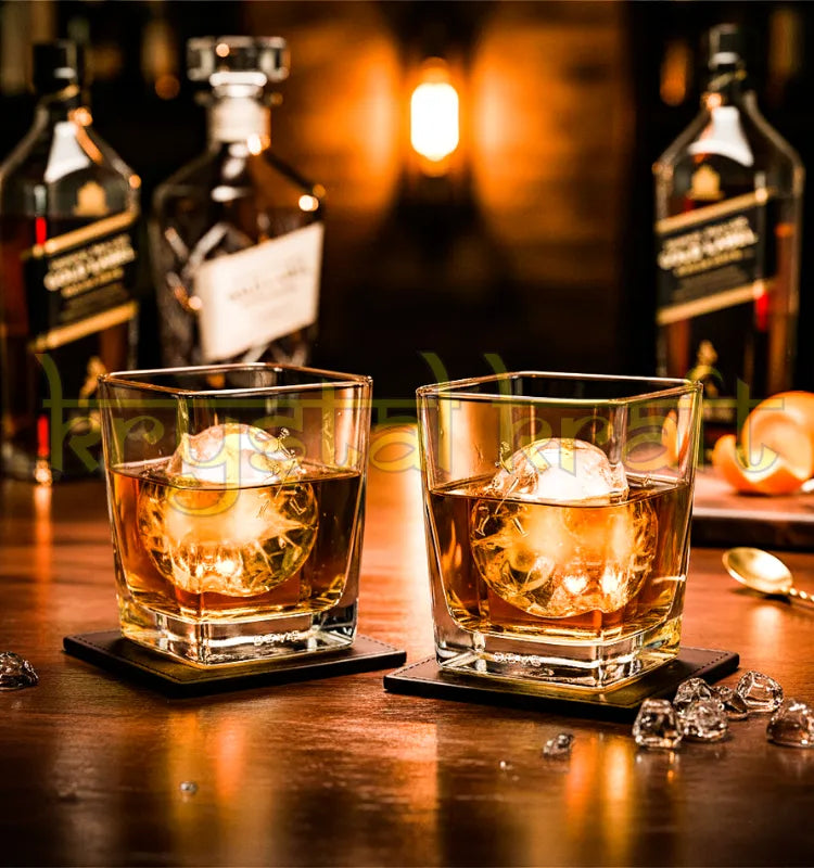 Upcycled Johnnie Walker Gold Label glasses handcrafted from recycled bottles for eco-friendly barware.