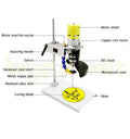 Adjustable speed electric bottle cutter machine with stainless steel body and rotating bottle setup.