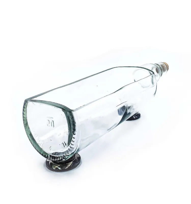 Glenlivet white bottle planter beside other Krystal Kraft table top bottle planters on a shelf