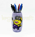 Eco-friendly Laughing Minion bottle art made from recycled glass with a purple base and yellow acrylic design — perfect as a mini vase, pen holder, or fun desk accent.