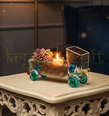Legacy Lane Truck Planter handcrafted by Raees Ahmed Merchant for Krystal Kraft, made from an upcycled Gold Label whisky bottle – vibrant eco-friendly planter and candle holder for sustainable home décor.