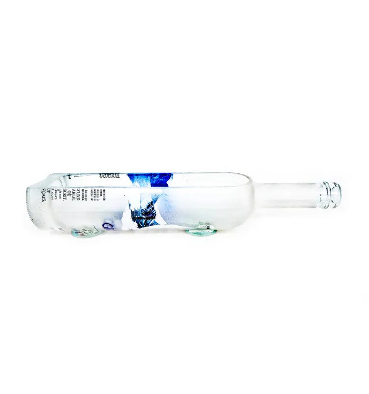 Modern glass bottle planter crafted from Grey Goose bottle for succulents