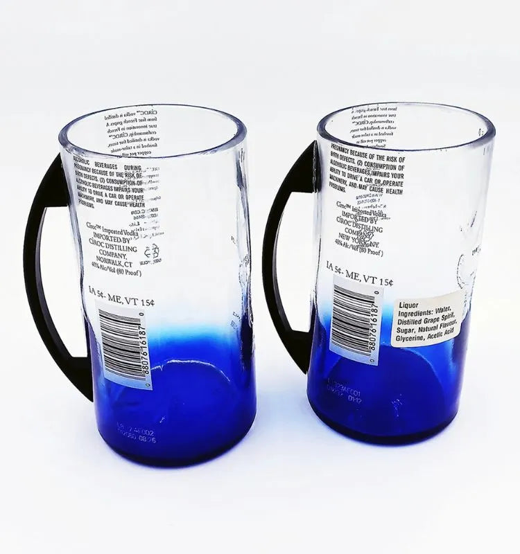 Sustainable upcycled Ciroc bottle mugs with original branding, crafted by artisans.”