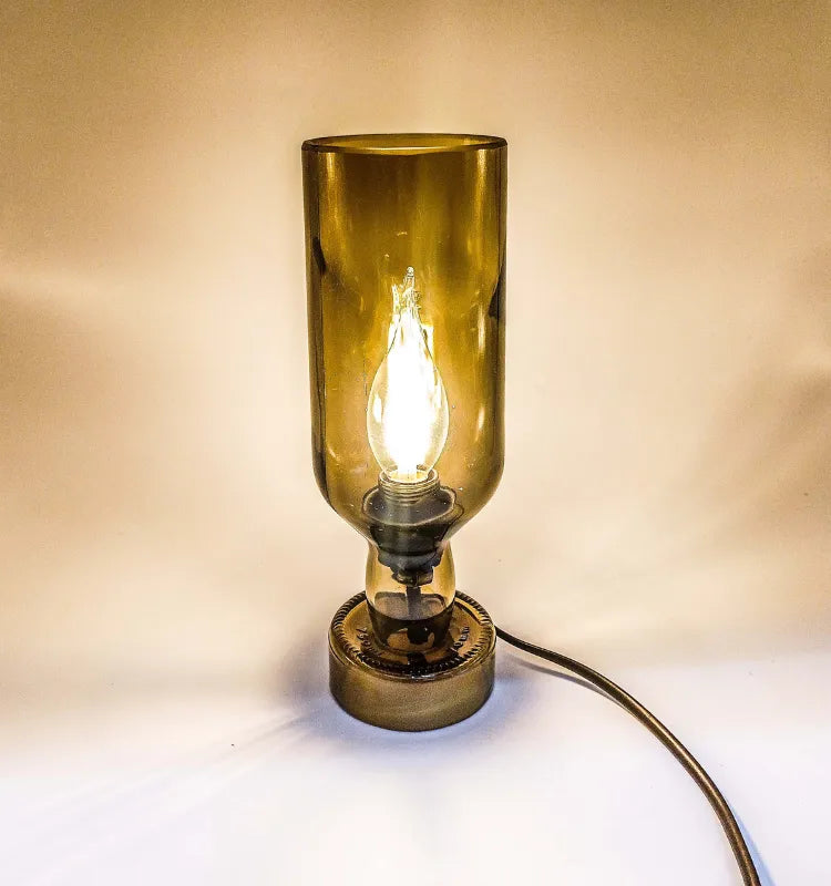 Beautiful eco-friendly recycled bottle lamp handcrafted in India by Krystal Kraft, perfect for ambient and accent lighting.