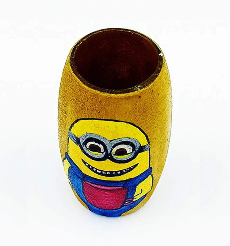 Eco-friendly Smiling Minion hand-painted on a recycled glass mini bottle, finished with acrylic and Liquitex sealant — perfect for décor or gifting.