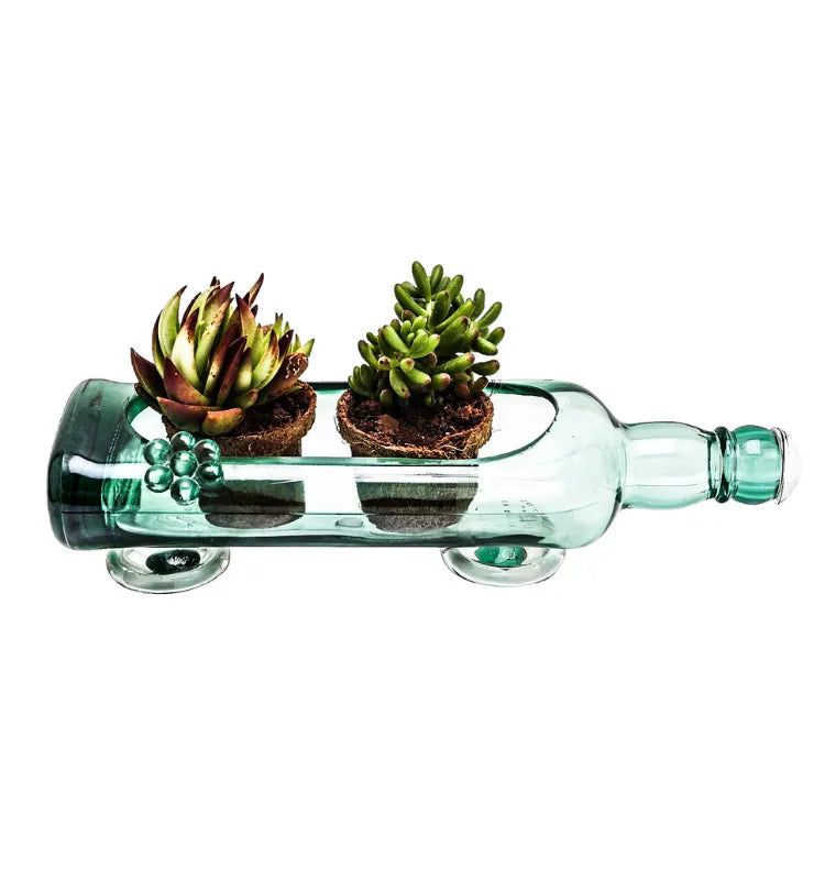 Handcrafted sea green glass planter made from an upcycled bottle
 eco-friendly-glass-bottle-planter
