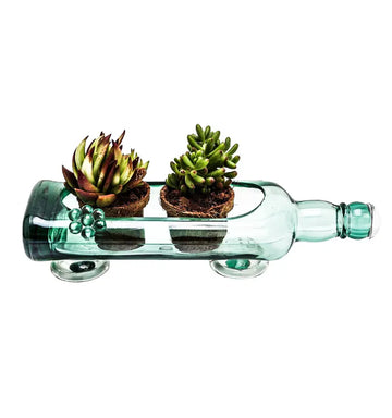 Handcrafted sea green glass planter made from an upcycled bottle
 eco-friendly-glass-bottle-planter