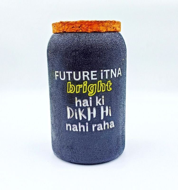 Krystal Kraft’s handcrafted upcycled Jaisalmer jar with the quote “Future itna bright hai ki dikh hi nahi raha,” ideal for eco-luxury decor, gifting, or home organization.
