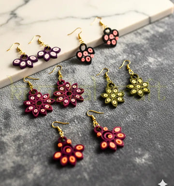 Multicolor handmade paper quilling earrings set crafted by Indian artisan Farisa Merchant for Krystal Kraft.