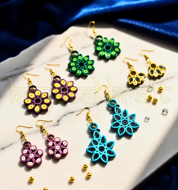 “Handmade multicolor sustainable paper quilling earrings set of 5 by artist Farisa Merchant – Krystal Kraft.”