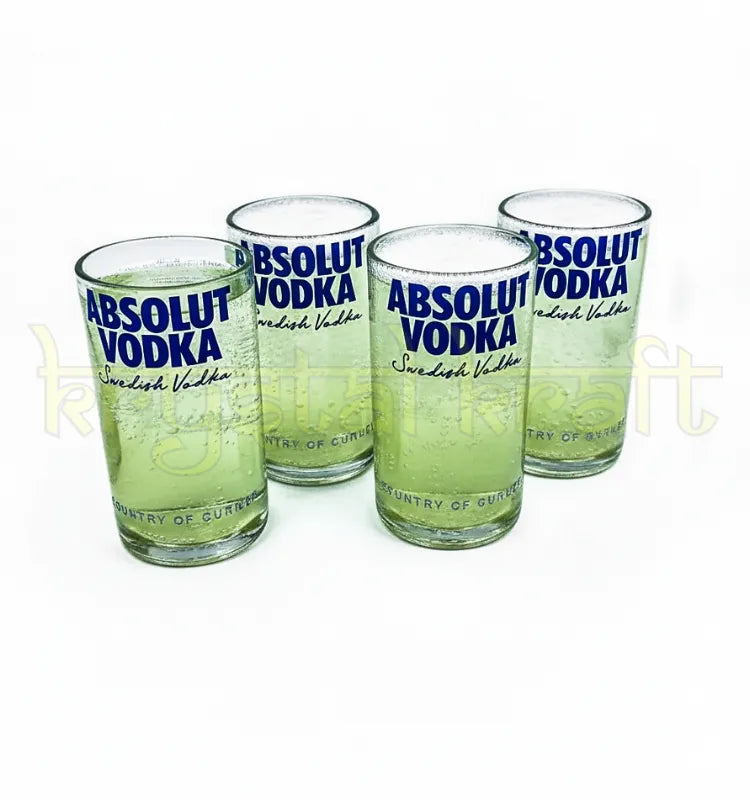 Set of four upcycled glass tumblers made from recycled Absolut bottles, ideal for home bars, cocktails, and eco-conscious living.