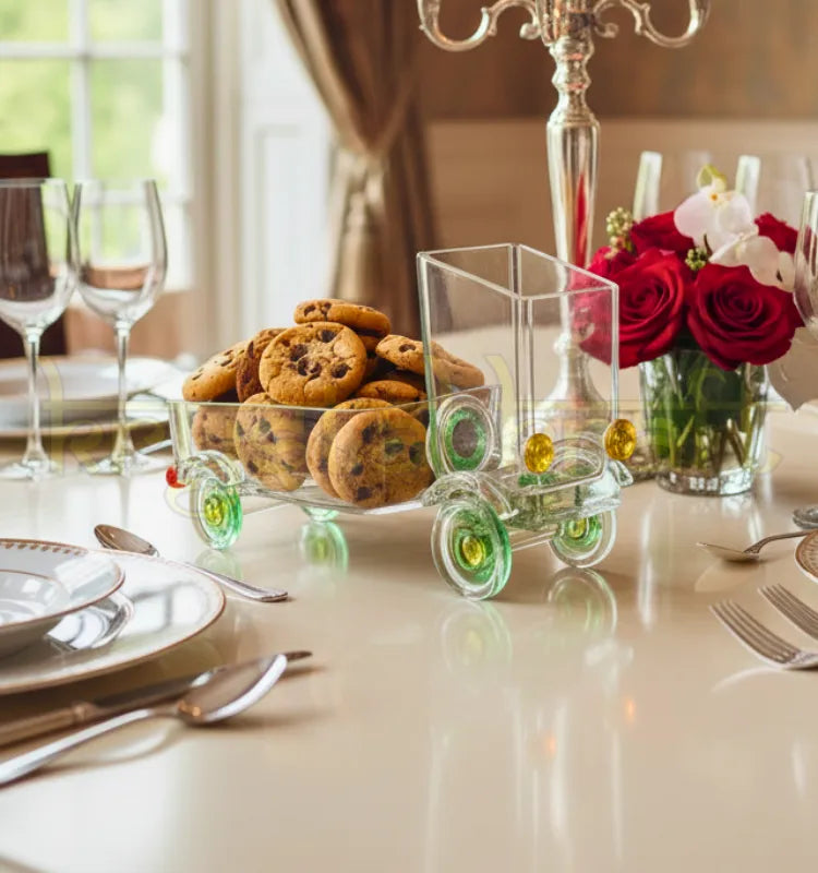 The Green Jaunt Truck handcrafted from an upcycled Gold Label whiskey bottle by Raees Ahmed Merchant for Krystal Kraft – eco-friendly truck-shaped décor piece blending sustainability and artistry."