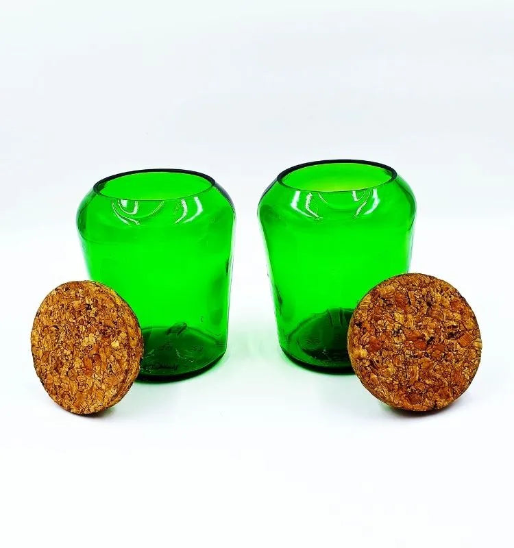 Artfully designed set of two upcycled Vat 69 jars showcasing craftsmanship, ideal for interior decoration, flower vases, or storage containers.