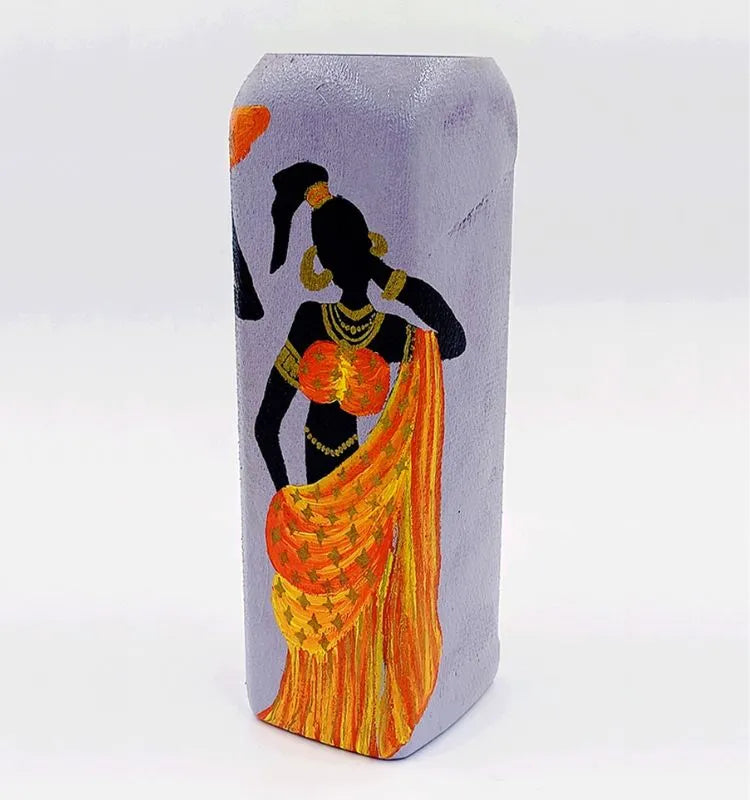Tribal-themed African Lady vase handcrafted on a recycled glass bottle, finished with Liquitex for protection — a stylish and sustainable décor piece.