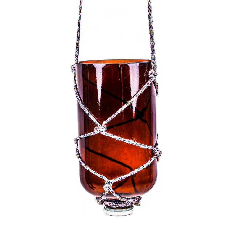 Upcycled 2L chemical brown glass hanging planter with jute rope, perfect for indoor and outdoor plants.