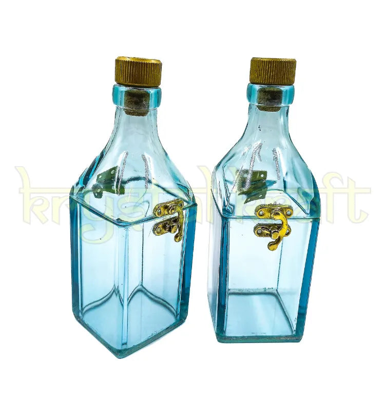 Exclusive handcrafted upcycled bottle decor created by Krystal Kraft artist studio.