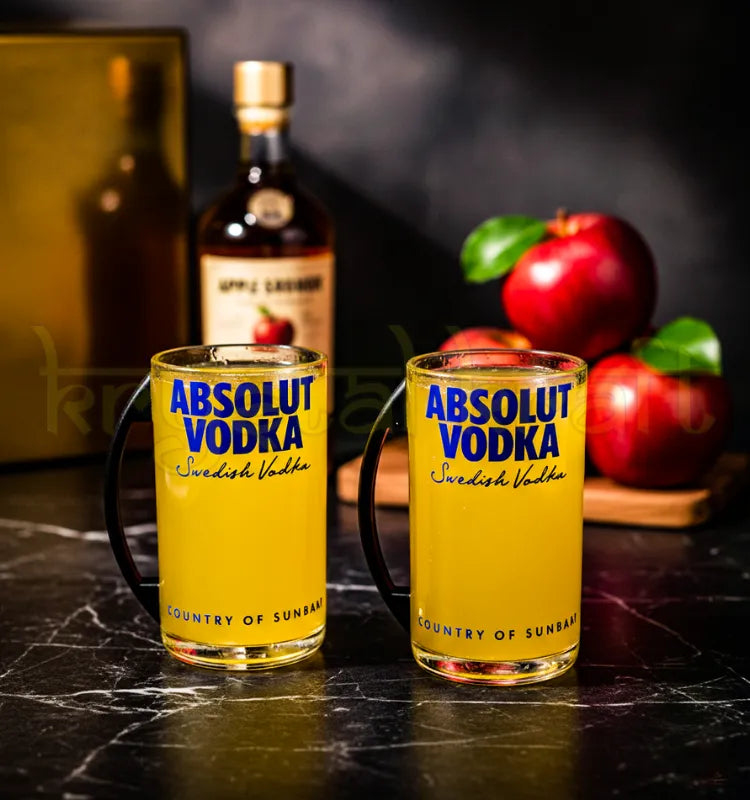 Handmade eco-friendly glass mugs crafted from Absolut bottles by Krystal Kraft