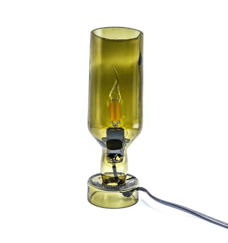 Eco-conscious table lamp made from recycled Sula wine bottle with warm LED glow, ideal for home and festive décor.